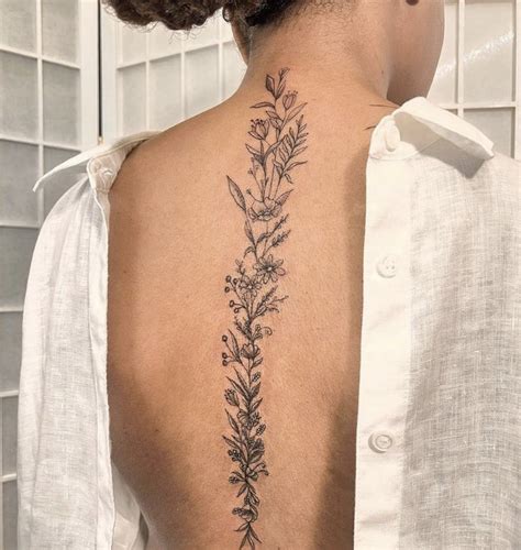 dainty spine tattoos